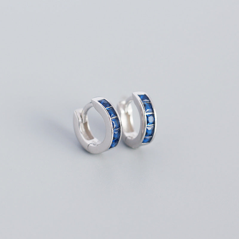 Sterling Silver Huggie Earring with blue CZ