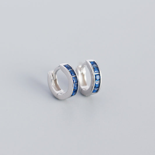 Sterling Silver Huggie Earring with blue CZ