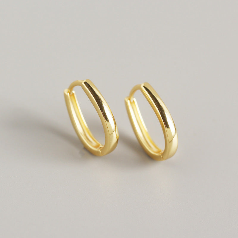 Sterling Silver with gold plated Huggie Earring